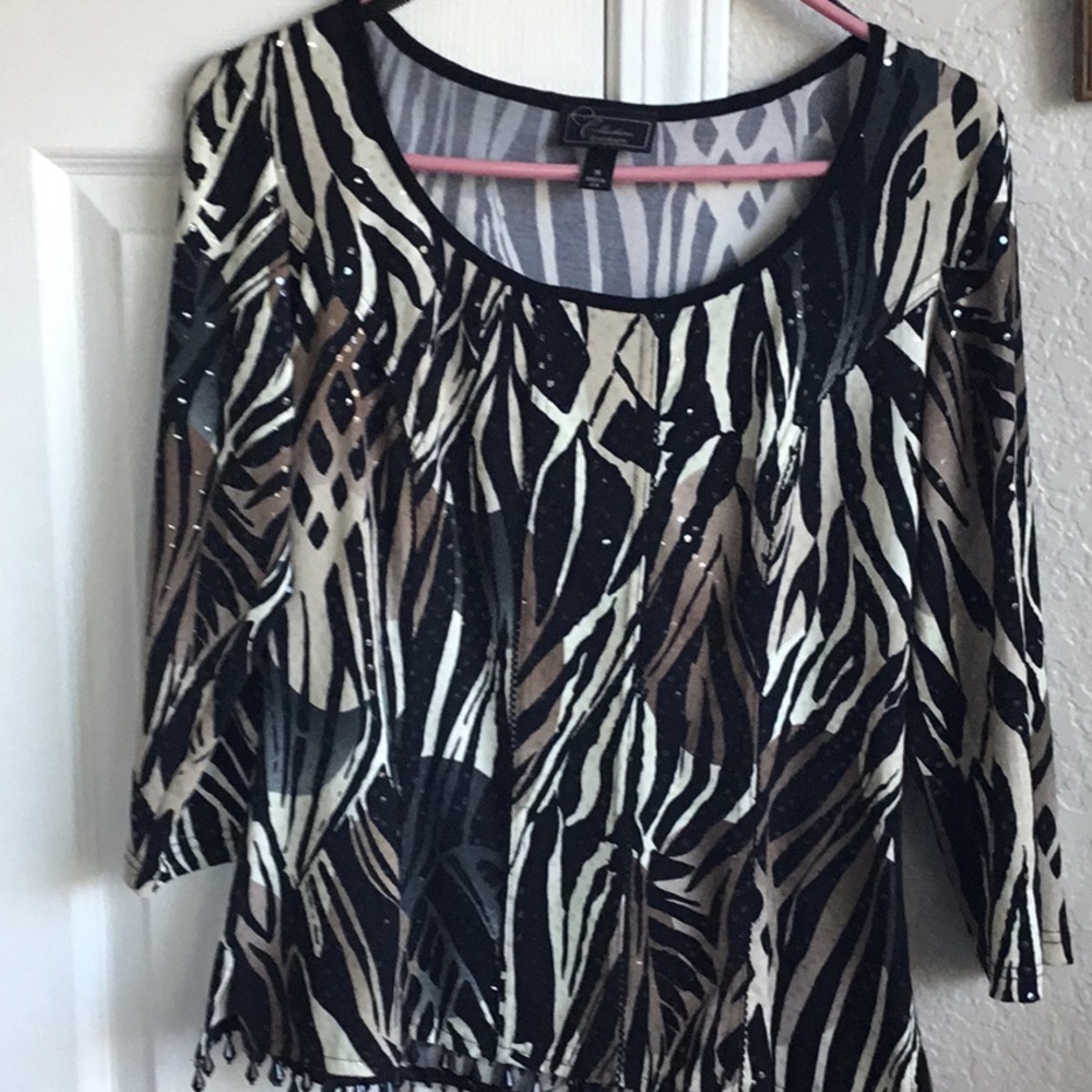 Fun animal print top with sequins.